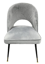 Gray velvet chairs with black legs 