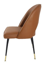 Brown leather chair with black legs and gold tips on a white background