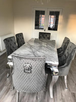 A Luxurious Rectangular Grey Marble Dining Table, Supported With Strikingly Steel Polished Chrome Legs This Stunning Feature To Place In Your Spectacular Dining Area .
Elegant Seating Up To 6 People With These Immaculately Designed Lion Knocker Back, Velvet Dining Chairs Available In 2 Options In Choice Of Colour Grey Velvet &amp; Cream Velvet Both Beautifully Detailed ..
Dining Table Size - 1.8cm x 90cm x 75cm
Dining Chairs Sizes - Height 90cm x 54cm